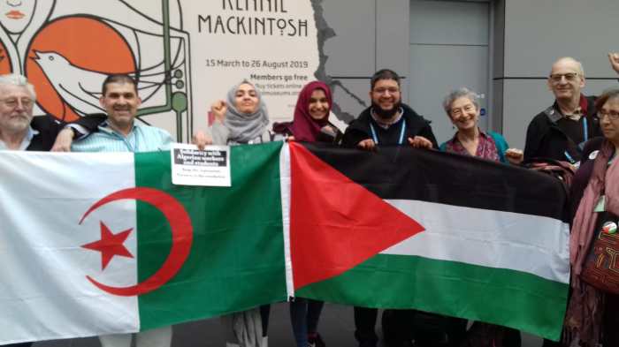 Activists at NEU congress 2019 show solidarity with the struggles in Palestine and Algeria for freedom. Picture: Miriam Scharf